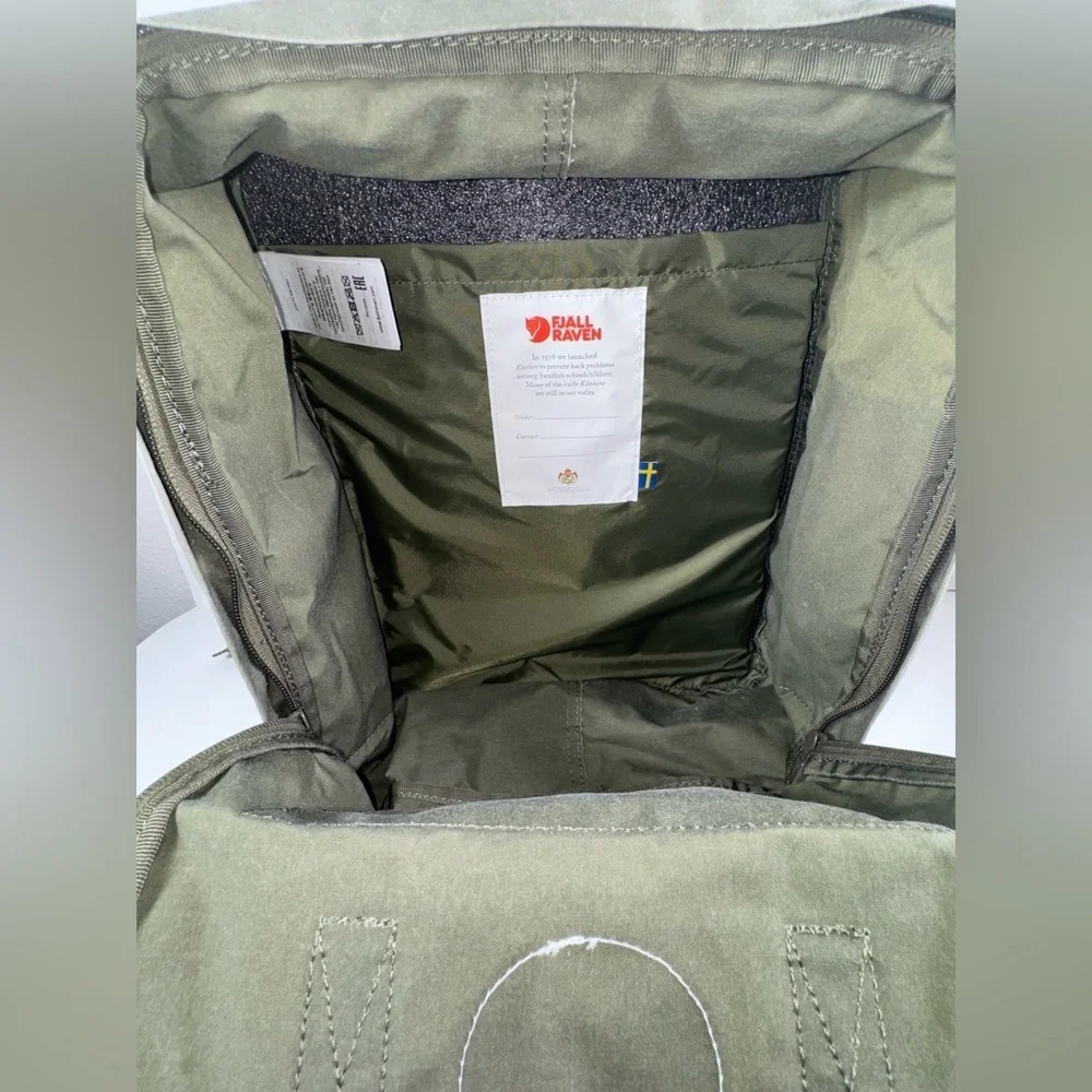 Fjallraven Kanken Backpack in Olive Green with Red Logo
